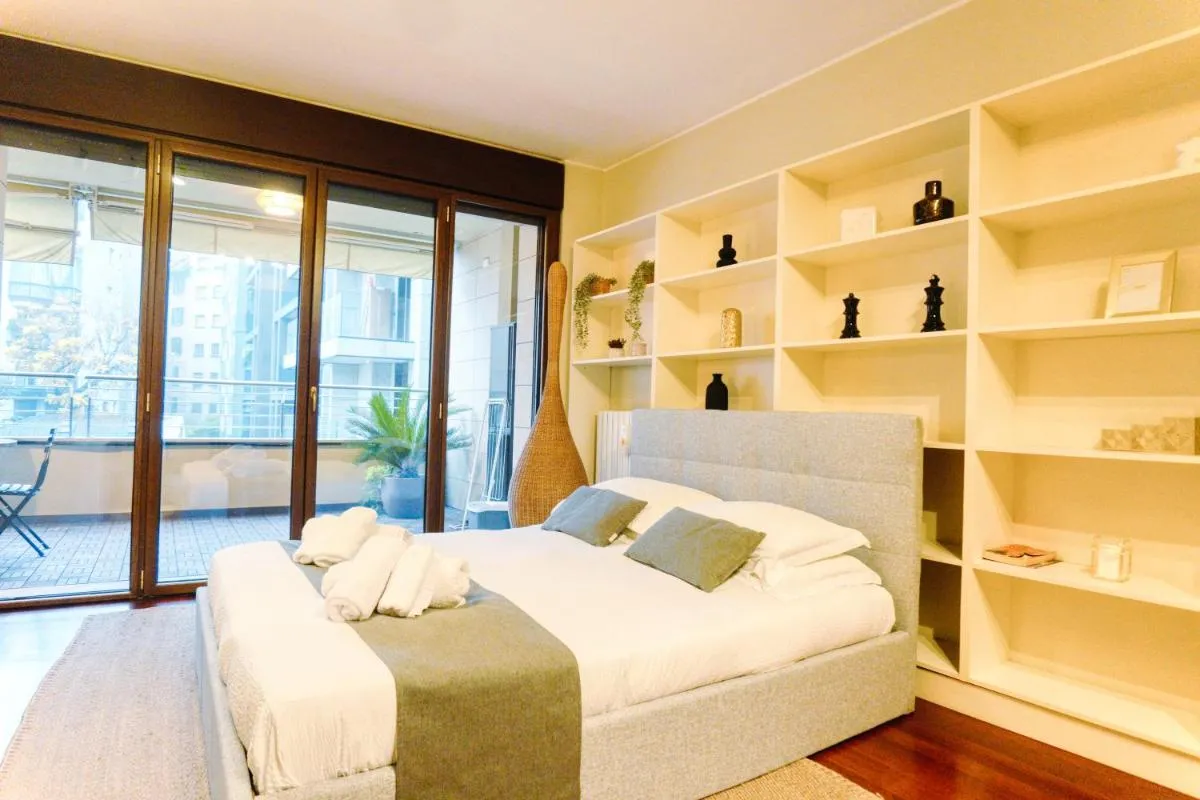 Image 1 of CityLife Prime Suites – In front of the Shopping District with Big Terrace and Gym