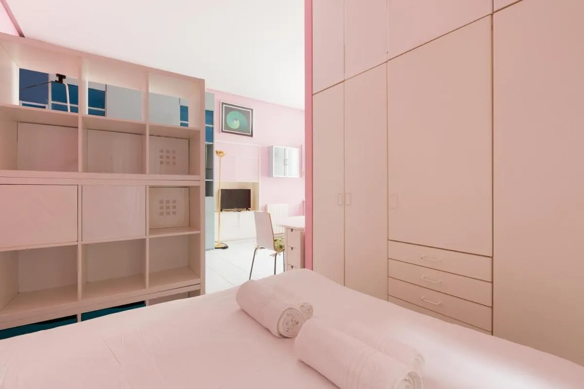Image 1 of GuestHost – Isola Cosy Pink Studio Apt