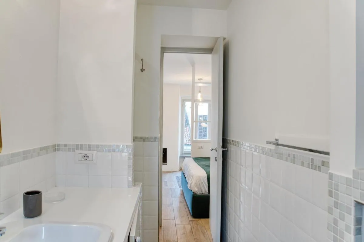 Image 2 of Sant’Ambrogio historic apartment – In front of Cattolica